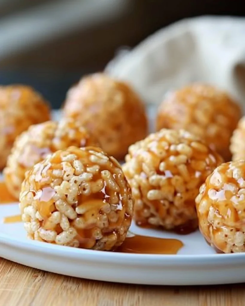 Delicious Caramel Marshmallow Rice Krispie Balls recipe with marshmallows and caramel.