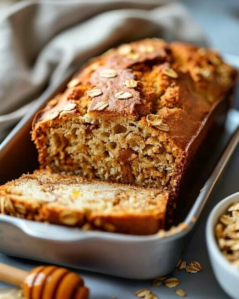 Delicious slice of honey-cinnamon oatmeal bread fresh from the oven